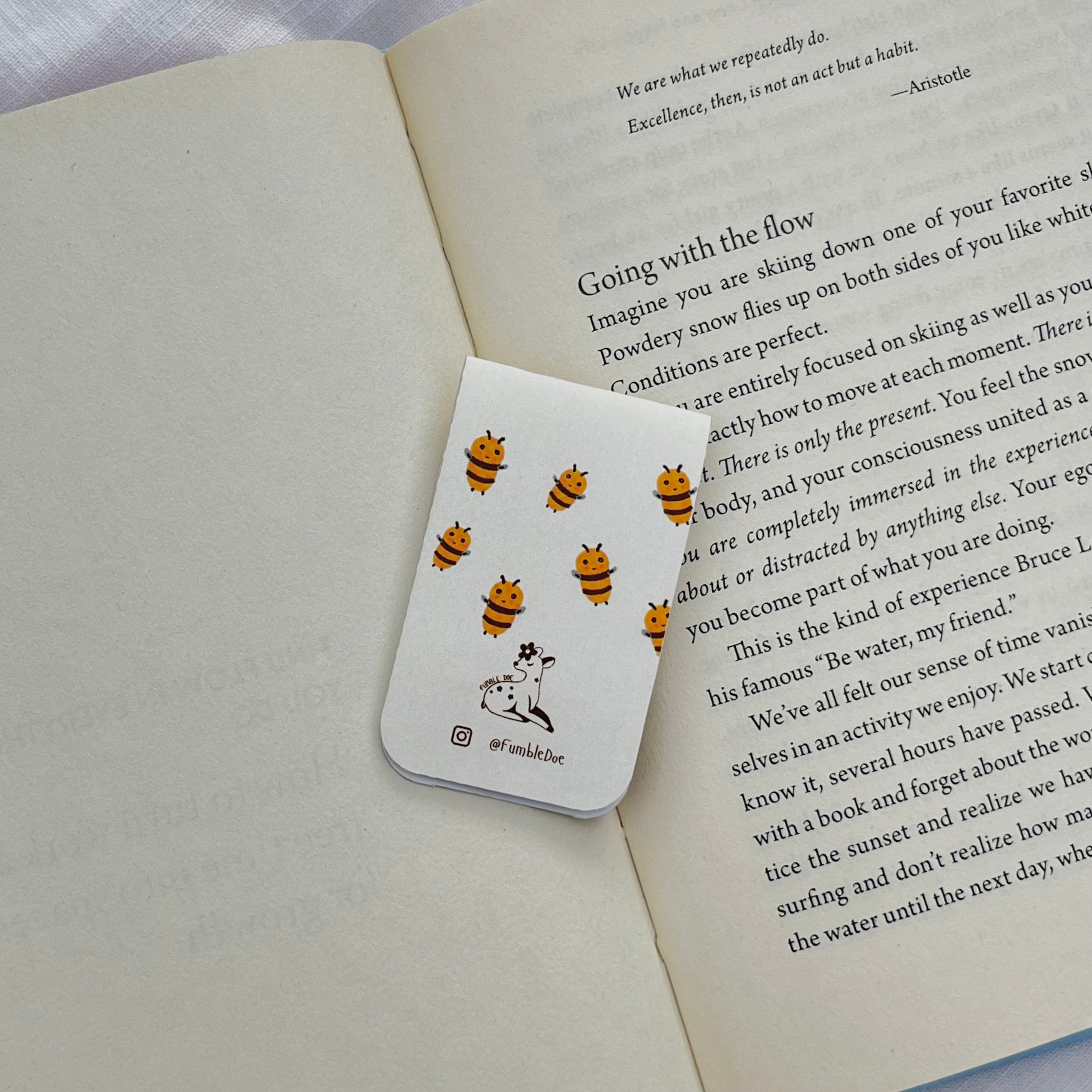 Bookmark with bee pattern on a book